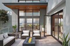 Folding door with contemporary panels, Black exterior, FSB 1075 hardware in Satin Stainless Steel; E-Series picture windows, Black exterior

Rendering of modern home style; door partially open