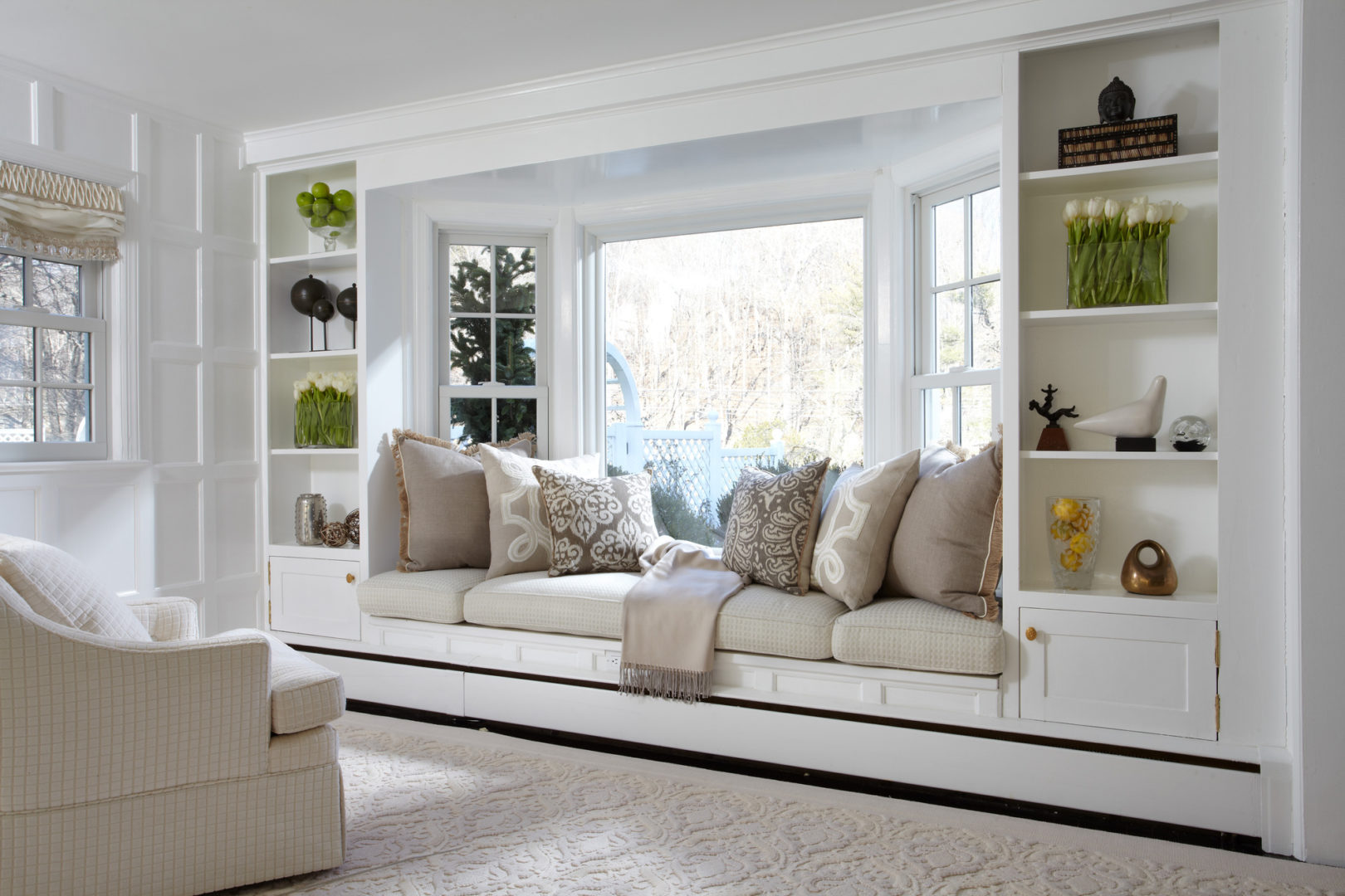 Window & Door Replacement New Berlin WI Interior of home with alcove and large bay window overlooking yard.