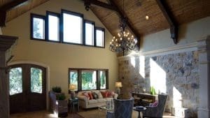 The living room of a luxury home with custom windows