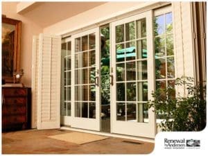 White sliding patio doors with attractive grid pattern from Renewal by Andersen